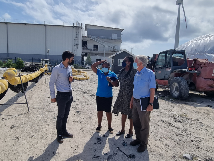 Sustainability consultant working in the field with stakeholders